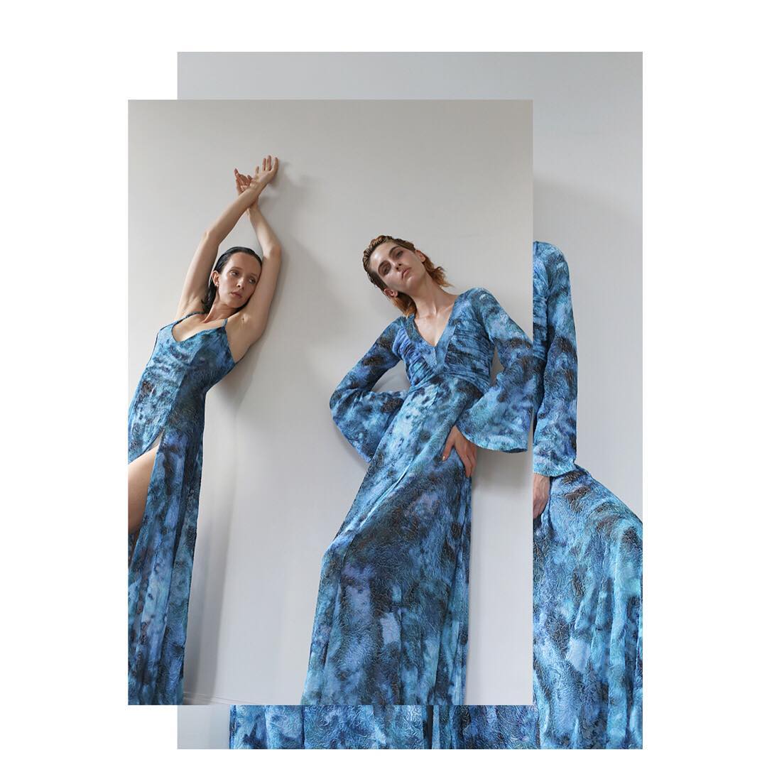 Two models wearing blue printed devore dresses